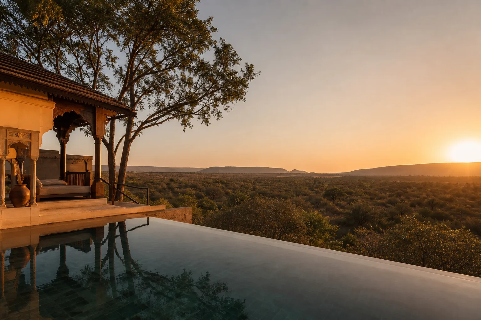 Private pool villa with infinity edge at golden hour
